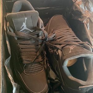 black cat jordan 4s
